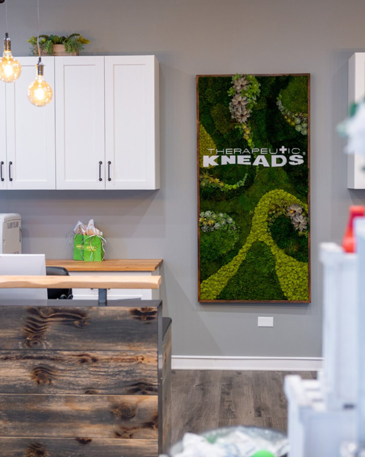 Clean, professional medical spa treatment room with neutral tones at Therapeutic Kneads Ltd. in Highland Park
